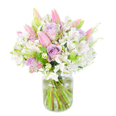 pastel colours flower arrangement in a vase - delivered by local florist